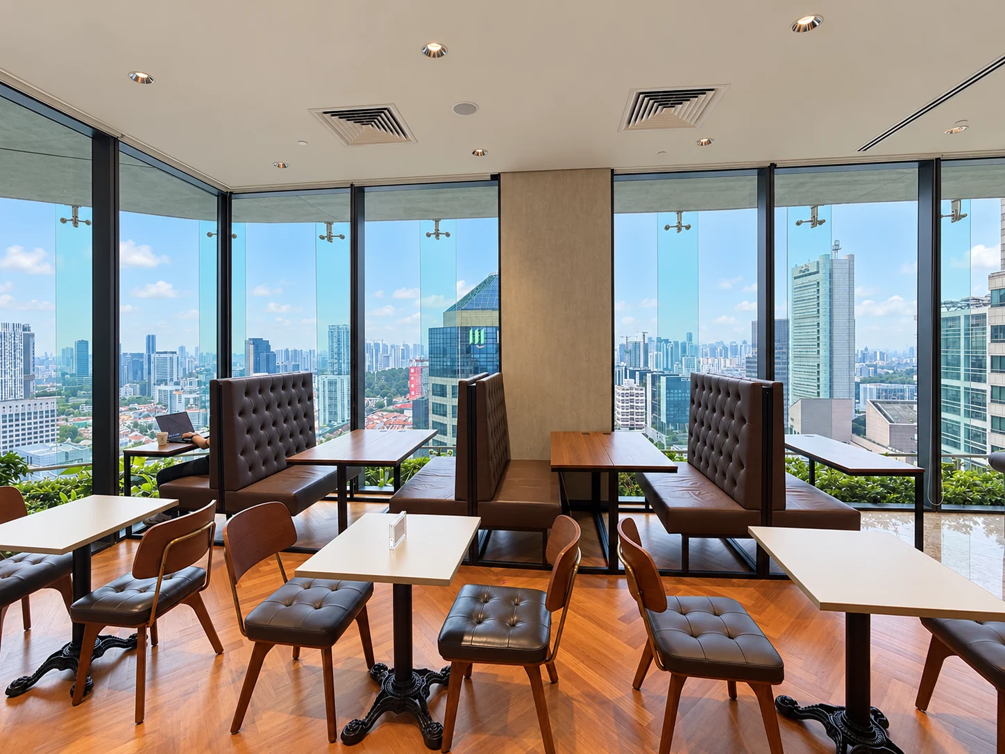 Shared seating and city views at CapitaGreen Level 24
