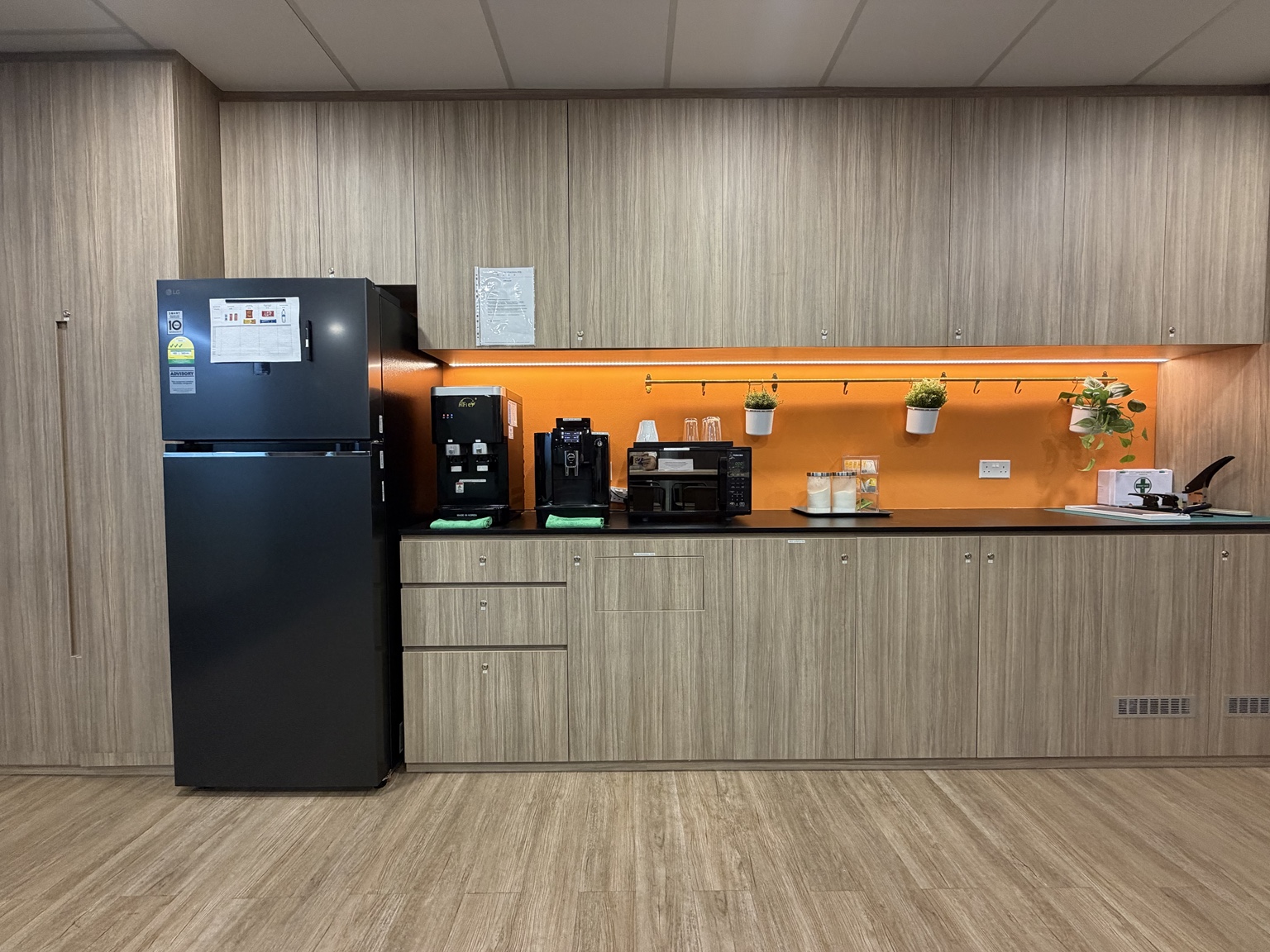 Pantry with refrigerator, coffee machines and microwave