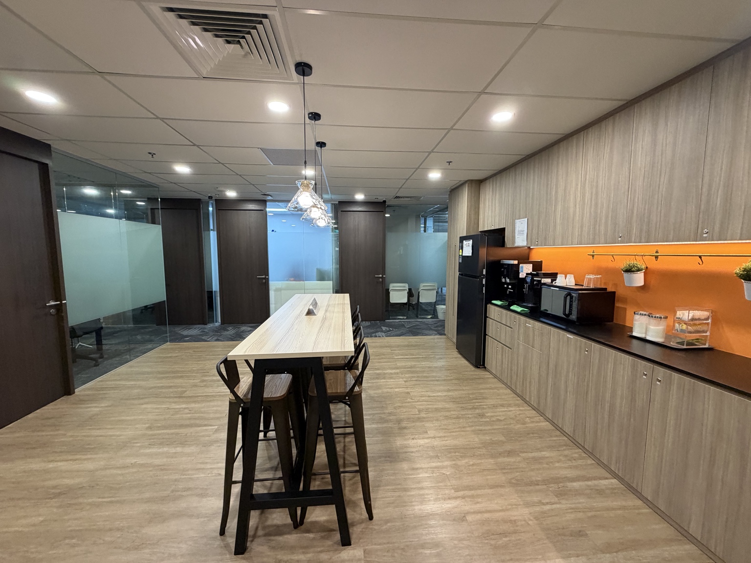 Another view of the shared area and pantry